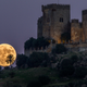 Moon rising behind the castle of Almodovar in Cordoba, Spain. Image: Miguel Morenatti/AP